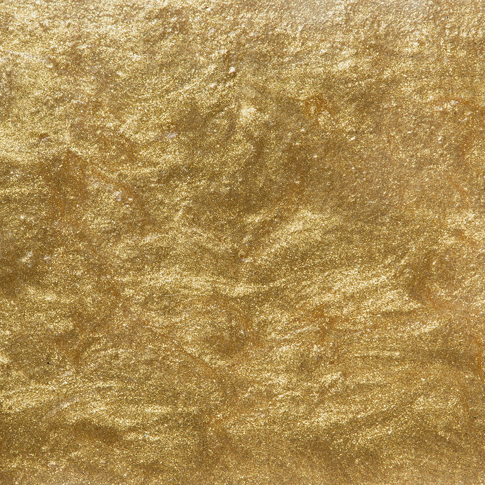 Textured gold background with a subtle pattern. Jewelry Lit by Desire - Natalie Noor