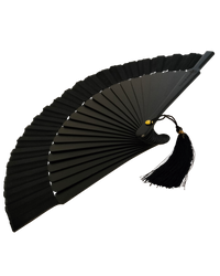 Black hand fan with tassels on a white background