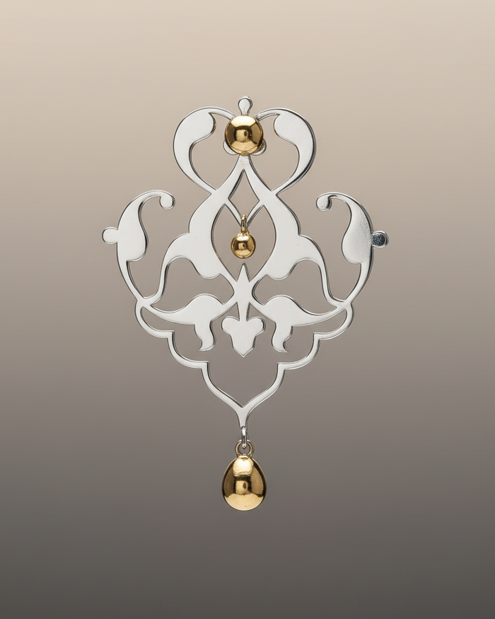 Ornamental silver earrings with golden pearls, design on a gradient background. Sharafeh collection, jewelry lit by disire, Maison Natalie Noor